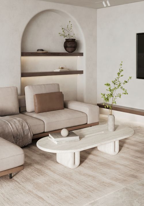 A modern living room with a beige sectional sofa, a minimalist coffee table, shelves with decor, and a plant. The ambiance is calm and neutral.